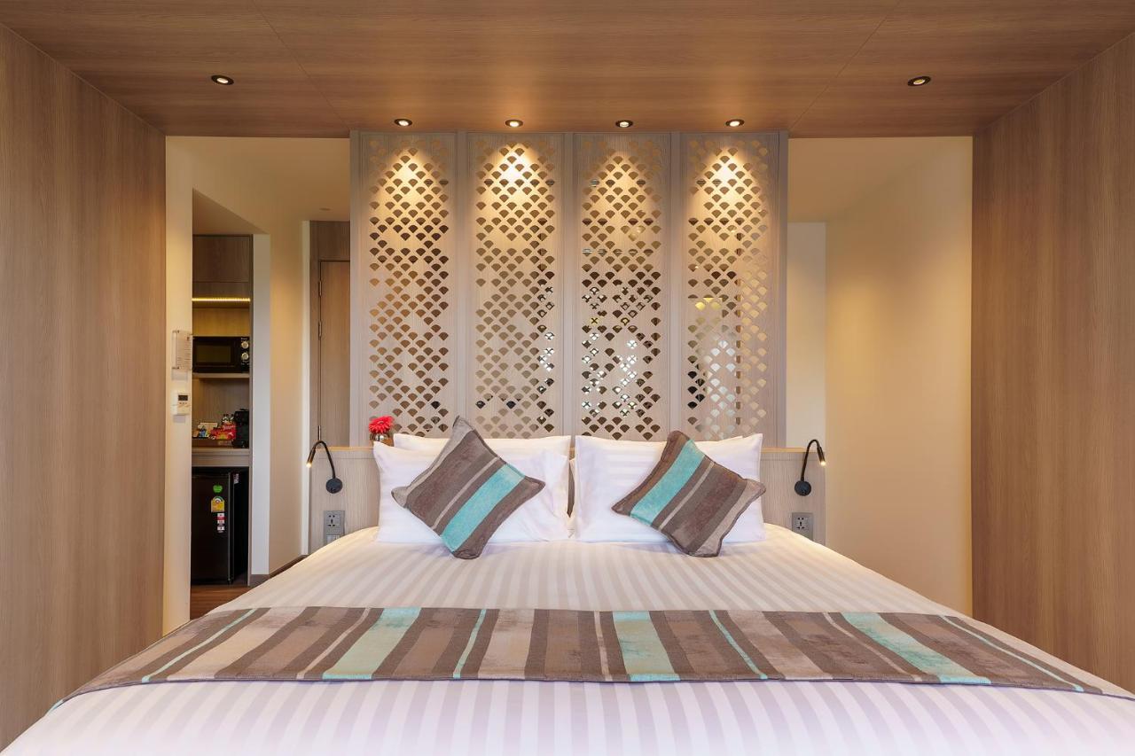 Fifth Pattaya Jomtien By Shiwalai Int Hotel Luaran gambar A bedroom at the hotel