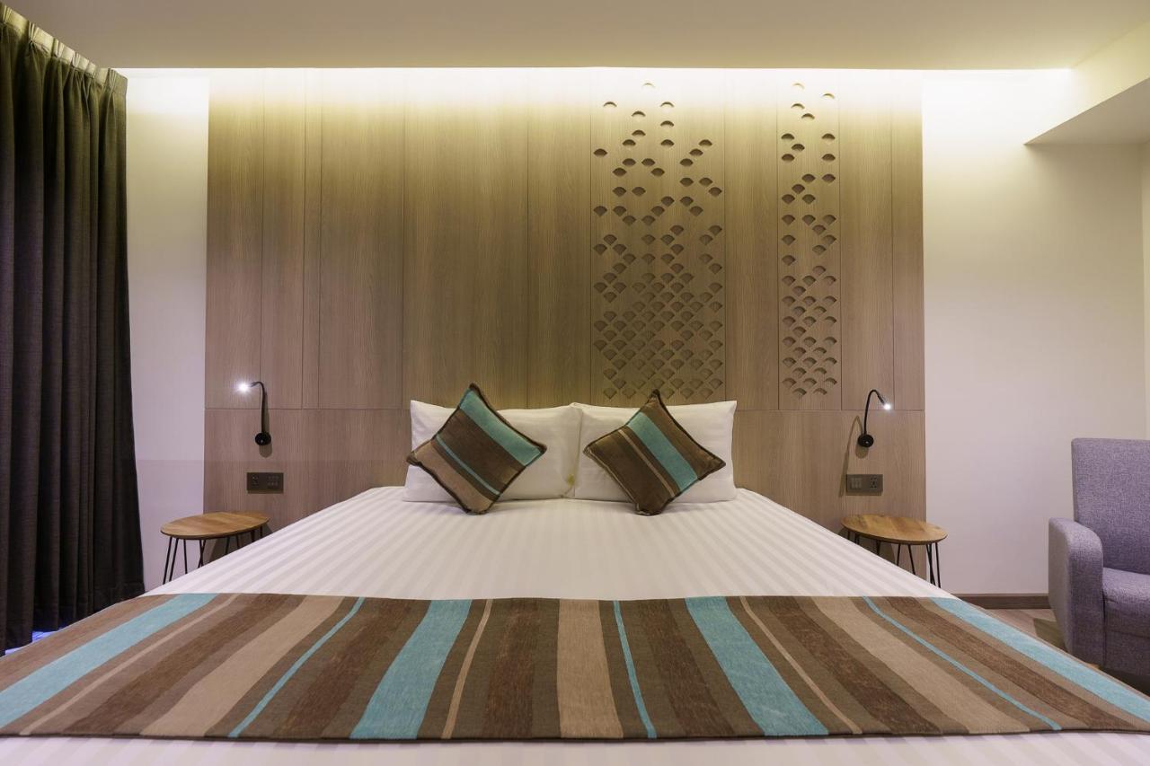 Fifth Pattaya Jomtien By Shiwalai Int Hotel Luaran gambar A bedroom at the hotel
